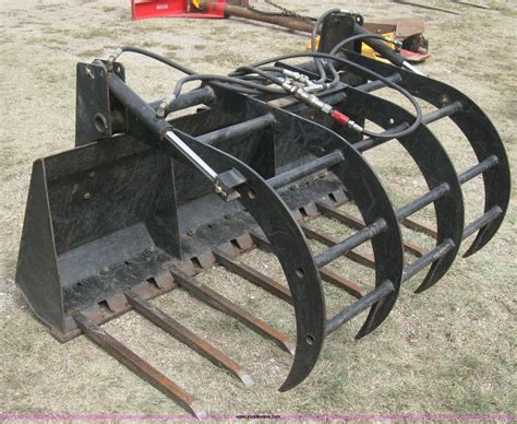 fork grapples skid steer|used grapples for skid steers.